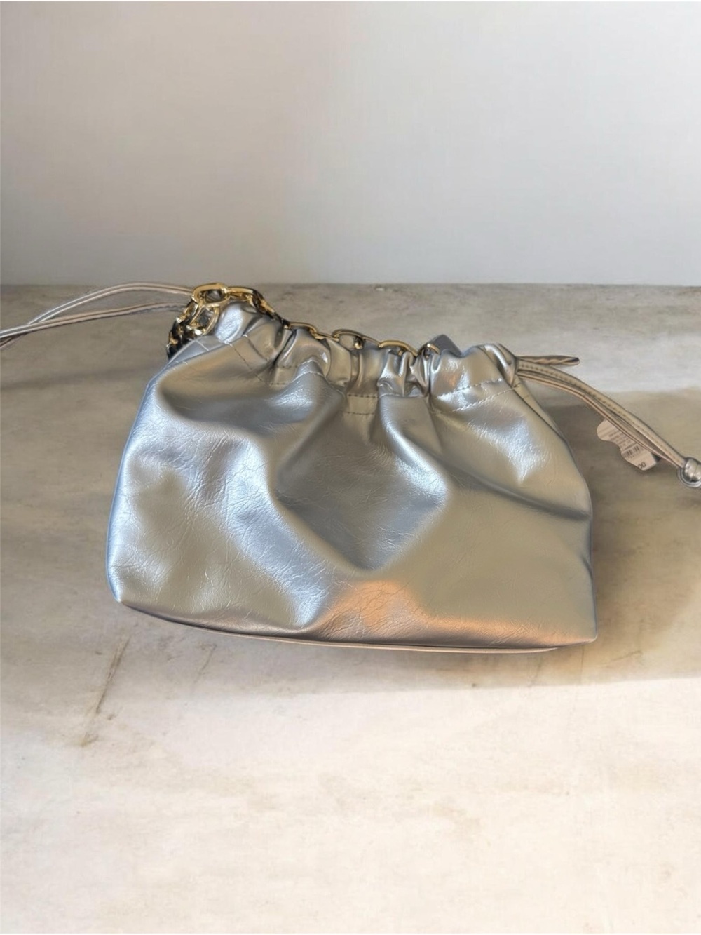 a new day Silver Drawstring purse with gold Chain Accent